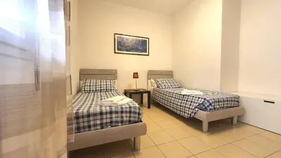 Letto o letti in una camera di Casa di Giada - 15 min to Venice - Large 2BR for 6