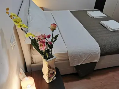 Letto o letti in una camera di Dimora Venice Station
