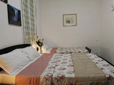 Letto o letti in una camera di Dimora Venice Station