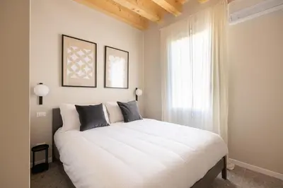 Letto o letti in una camera di Palazzo Cividale - Central Luxury Suite 03
