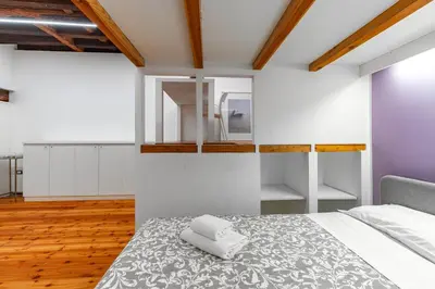 Letto o letti in una camera di Ca' Renaissance