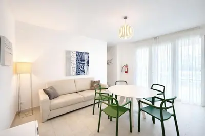 Area soggiorno di Les Maisons - Carraro Immobiliare - Family Apartments