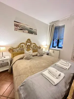 Letto o letti in una camera di Caterina Biennale Apartment