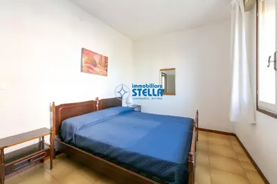 Letto o letti in una camera di Casa Romeo