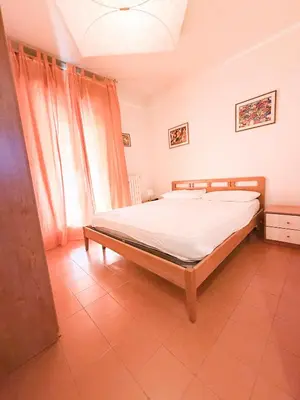 Letto o letti in una camera di Residence LA POSTA con Piscina