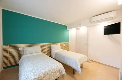 Letto o letti in una camera di CASA LETIZIA-Venice