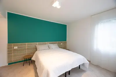 Letto o letti in una camera di CASA LETIZIA-Venice
