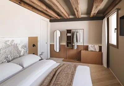 Letto o letti in una camera di Dimora Cadorin Apartments