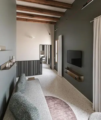 Letto o letti in una camera di Dimora Cadorin Apartments