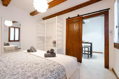 Letto o letti in una camera di Incantevole nido veneziano a 8 min da San Marco
