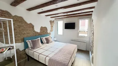 Letto o letti in una camera di Maison Studio