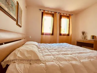 Letto o letti in una camera di Dolce Vita - Garden Apartment in City Center