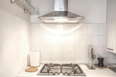 Cucina o angolo cottura di GuestHost - Elegant Apartment in Center of Padua