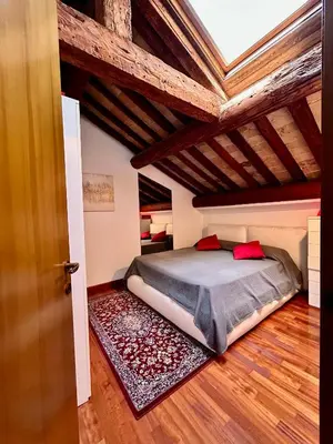 Letto o letti in una camera di GuestHost - Elegant Apartment in Center of Padua