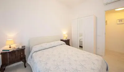 Letto o letti in una camera di Lizard Residence 2