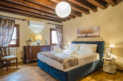 Letto o letti in una camera di Ca' del Pope