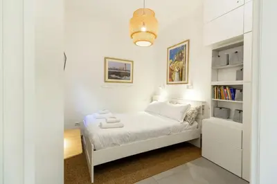 Letto o letti in una camera di Courtyard Flat near University & Center in Padua