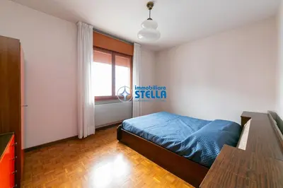 Letto o letti in una camera di Villa del Sole