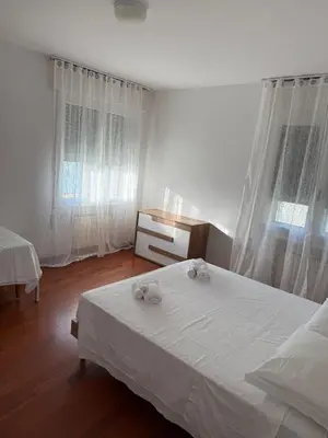 Letto o letti in una camera di Lido Loft