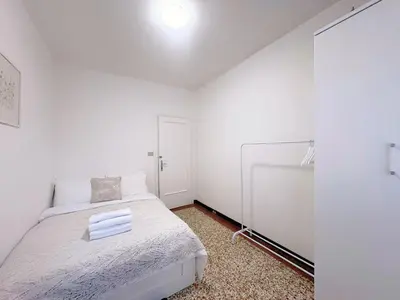 Letto o letti in una camera di Terra Apartment Venice Mestre