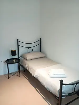 Letto o letti in una camera di Lar Doce Lar