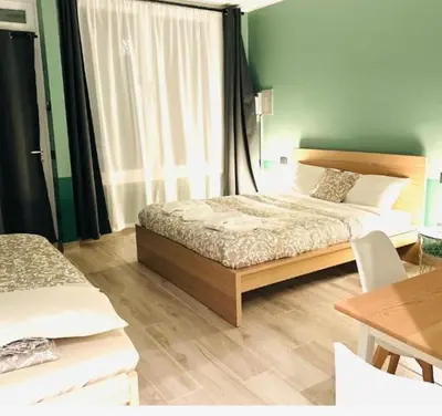 Letto o letti in una camera di Mini alloggi alle terme
