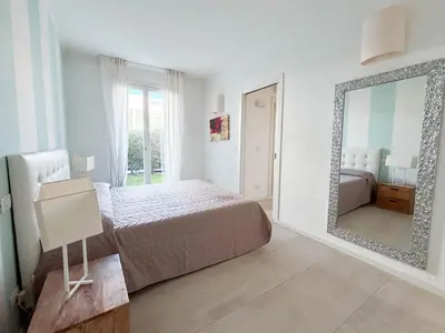Letto o letti in una camera di Villaggio Dei Pellicani