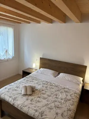 Letto o letti in una camera di Laguna Prive' - with private parking