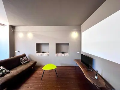 Area soggiorno di Open Space Apartment at the Portello
