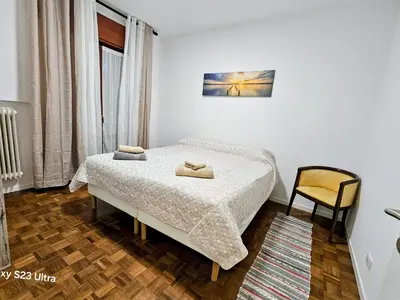Letto o letti in una camera di Casa Serena
