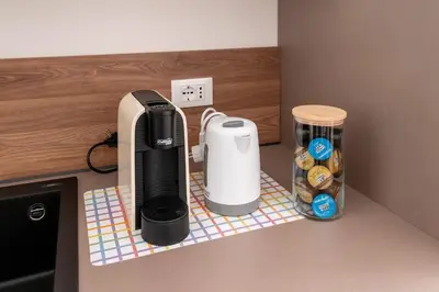 Set per la preparazione di tè e caffè presso Appartamento Sweet Jesolo