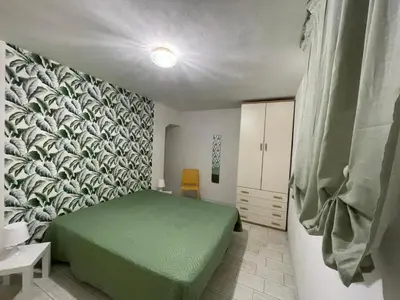 Letto o letti in una camera di Rosolina Holiday Home in the Mediterranean