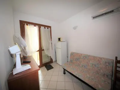 Letto o letti in una camera di Apartment in Rosolina for six guests