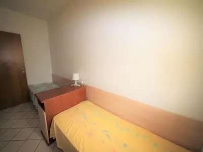 Letto o letti in una camera di Apartment in Rosolina for six guests