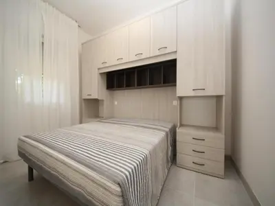 Letto o letti in una camera di Modern Comfort in Rosolina near Beach
