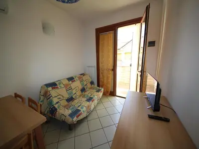 Area soggiorno di Apartment for Six in Rosolina