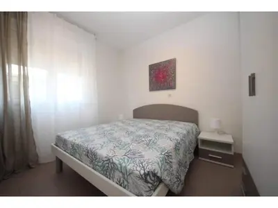 Letto o letti in una camera di Apartment with easy access to the beach