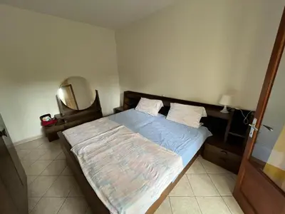 Letto o letti in una camera di Flexible 6-Person Stay in Rosolina Mare