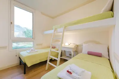 Letto o letti in una camera di Alberto Flat - in front of the beach & 20 min to Venice