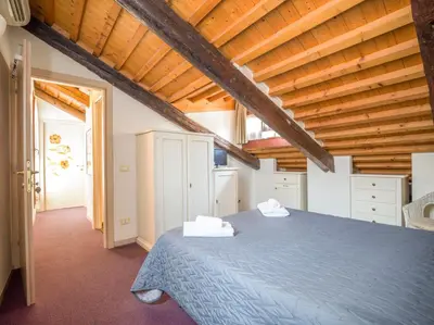 Letto o letti in una camera di Ca' dei Fuseri
