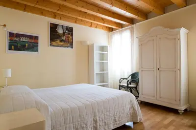 Letto o letti in una camera di Ca' dei Fuseri