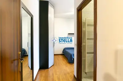 Letto o letti in una camera di Condominio Minetto