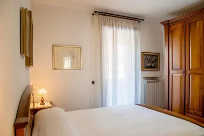 Letto o letti in una camera di Appartamento Vittoria - Catene Marghera