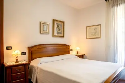 Letto o letti in una camera di Appartamento Vittoria - Catene Marghera
