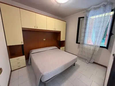 Letto o letti in una camera di Rosolina Mare Apartment near Beach