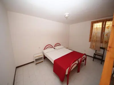 Letto o letti in una camera di Seaside retreat near Rosolina Mare beach