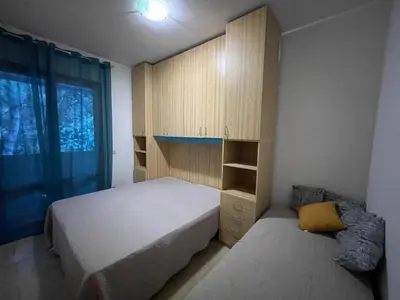 Letto o letti in una camera di Group Stay in Apartment with Parking