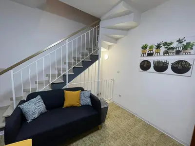 Area soggiorno di Group Stay in Apartment with Parking