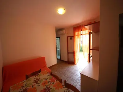 Letto o letti in una camera di Spacious Apartment in Rosolina Mare