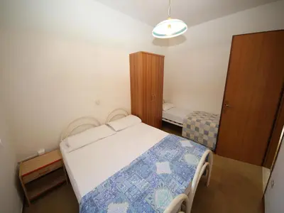 Letto o letti in una camera di Spacious Apartment in Rosolina Mare
